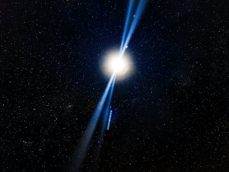 A radiant starburst illuminates the vast galaxy, casting blue rays through the star-filled night sky.