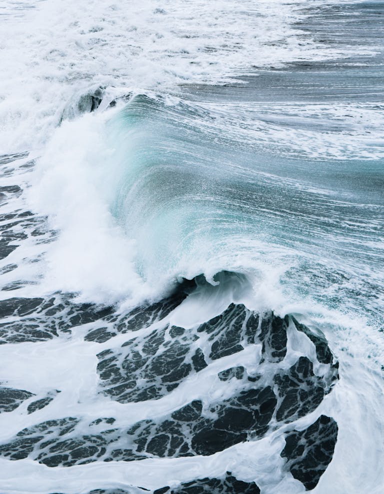 Captivating ocean wave crashing at Newport Beach, CA, showcasing nature's power.
