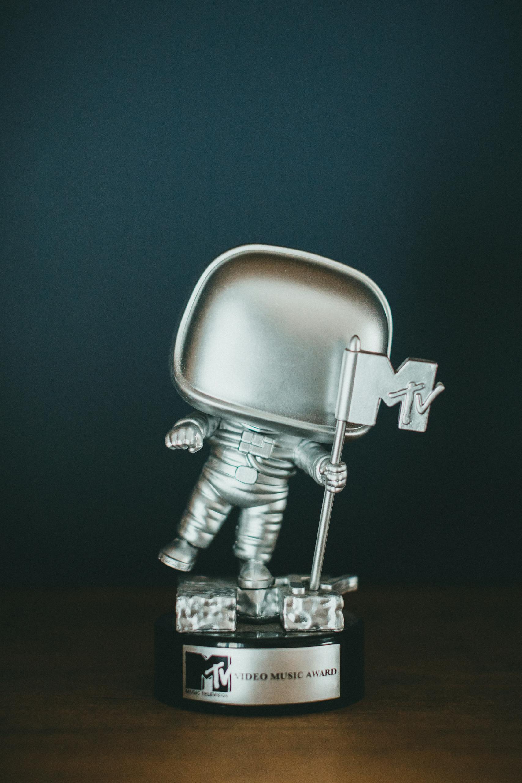 Iconic silver MTV astronaut trophy, symbolizing achievement in music.